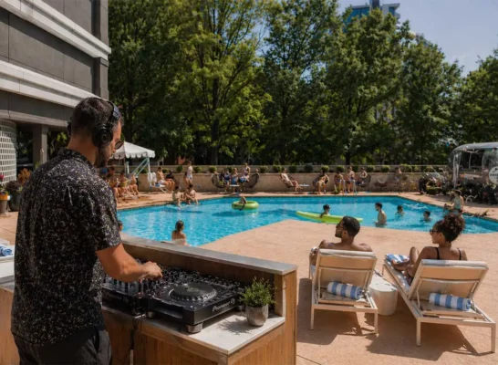 DJ spinning poolside at The American Hotel in Atlanta
